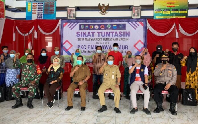 PKC PMII Jawa Timur Gelar Vaksinasi dan Bagi-bagi Sembako di Sampang
